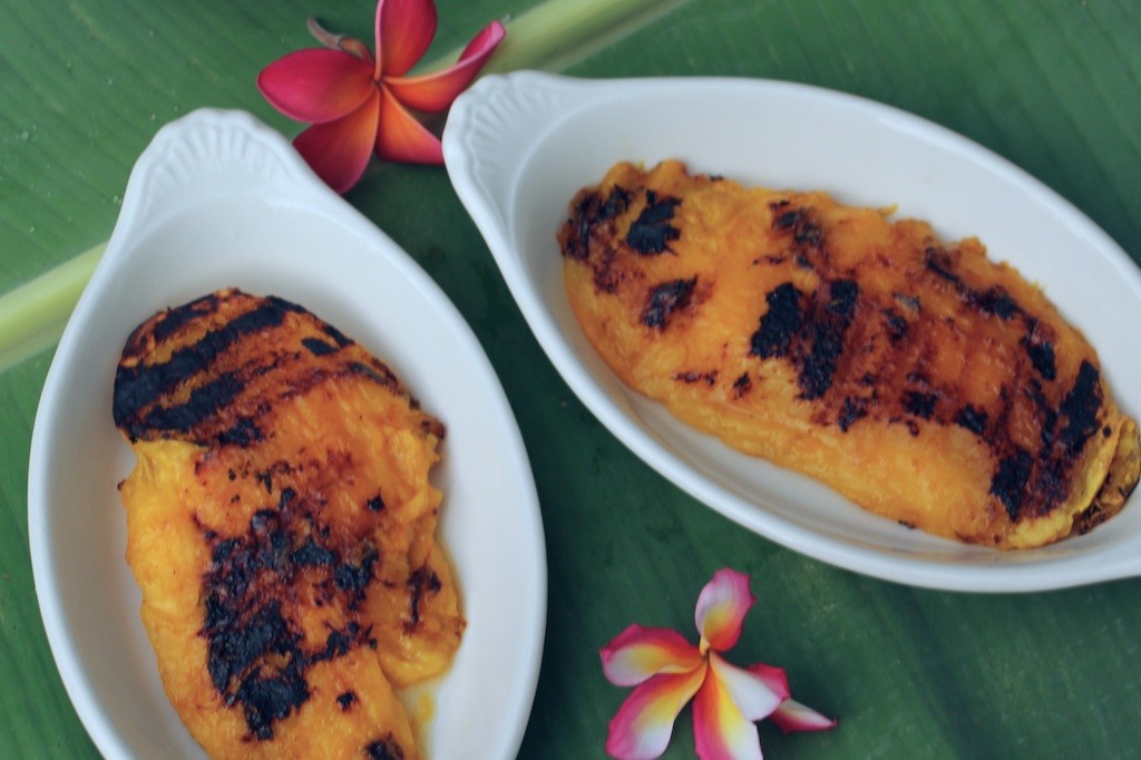 two grilled mango cheeks